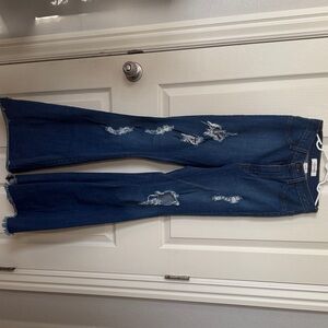 Distressed Dark Blue Flare Jeans for Women - Brand Not Visible